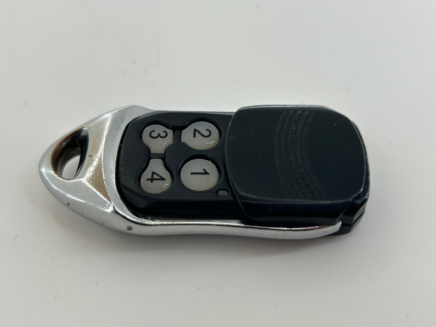 Chamberlain hand transmitter remote control radio button radio push button remote control switch transmitter